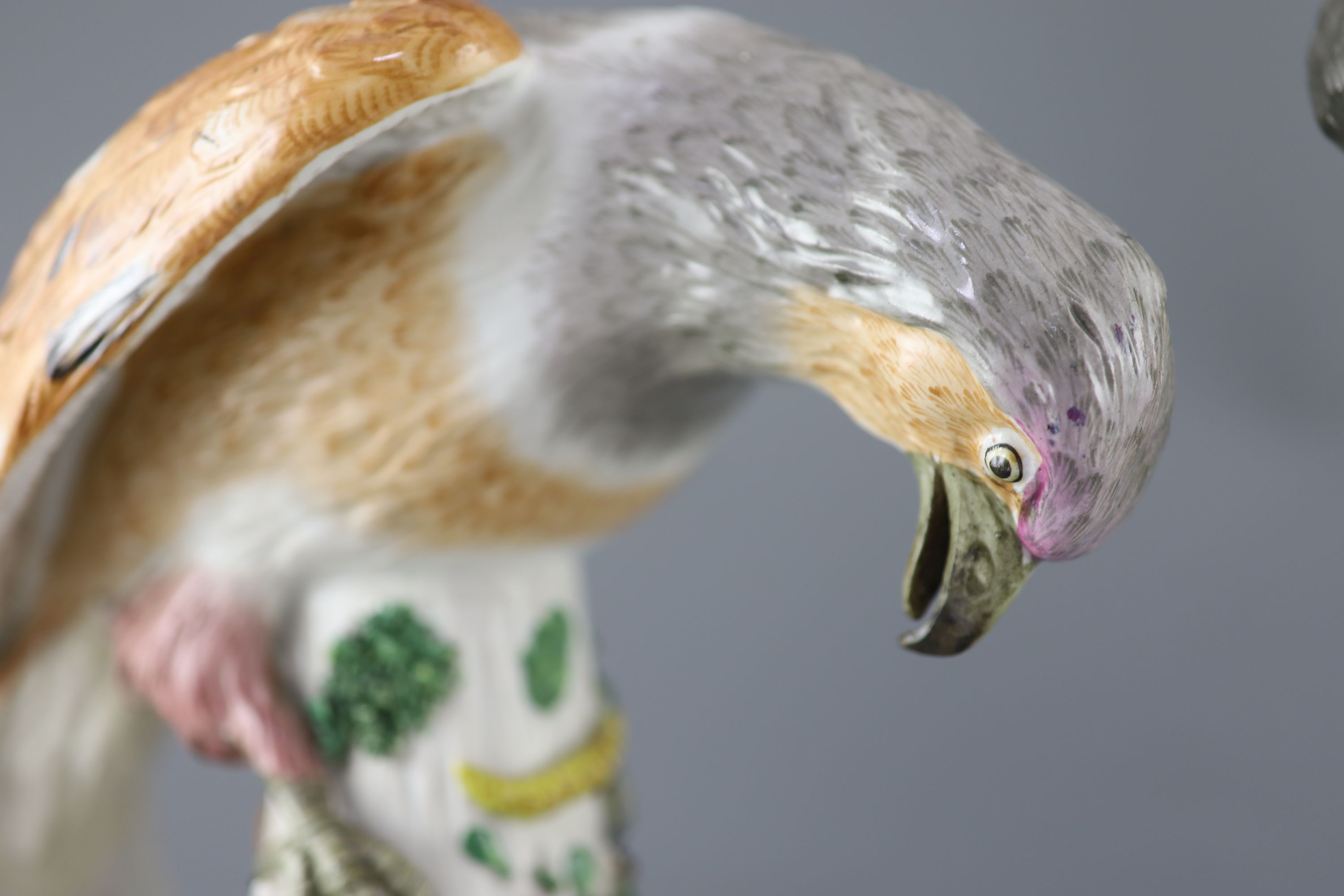 A pair of large German porcelain models of raptors, late 19th century, 37cm and 39cm